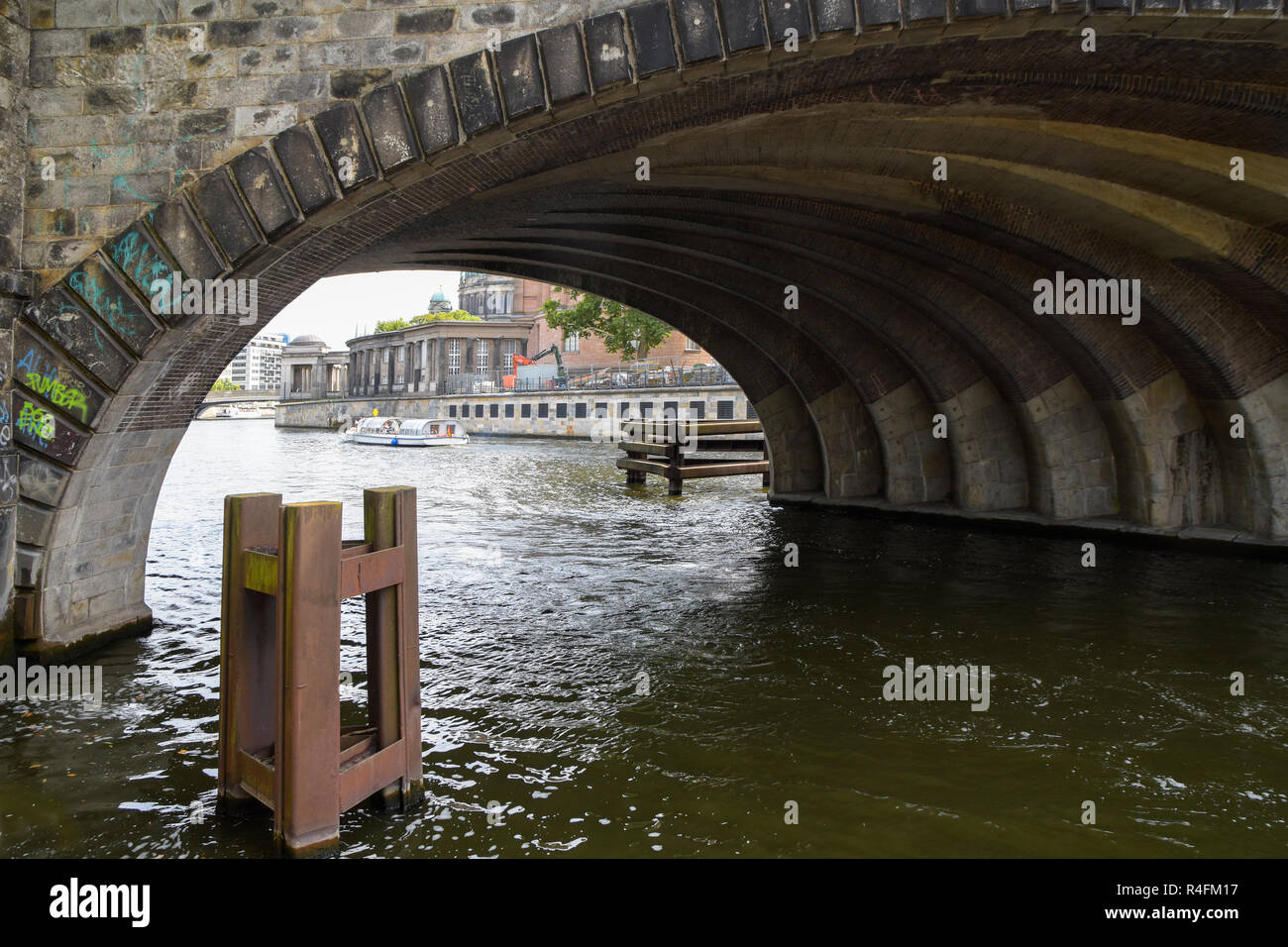under a bridge on the river spree in Berlin, central Mitte district in the capital city of Germany Stock Photo