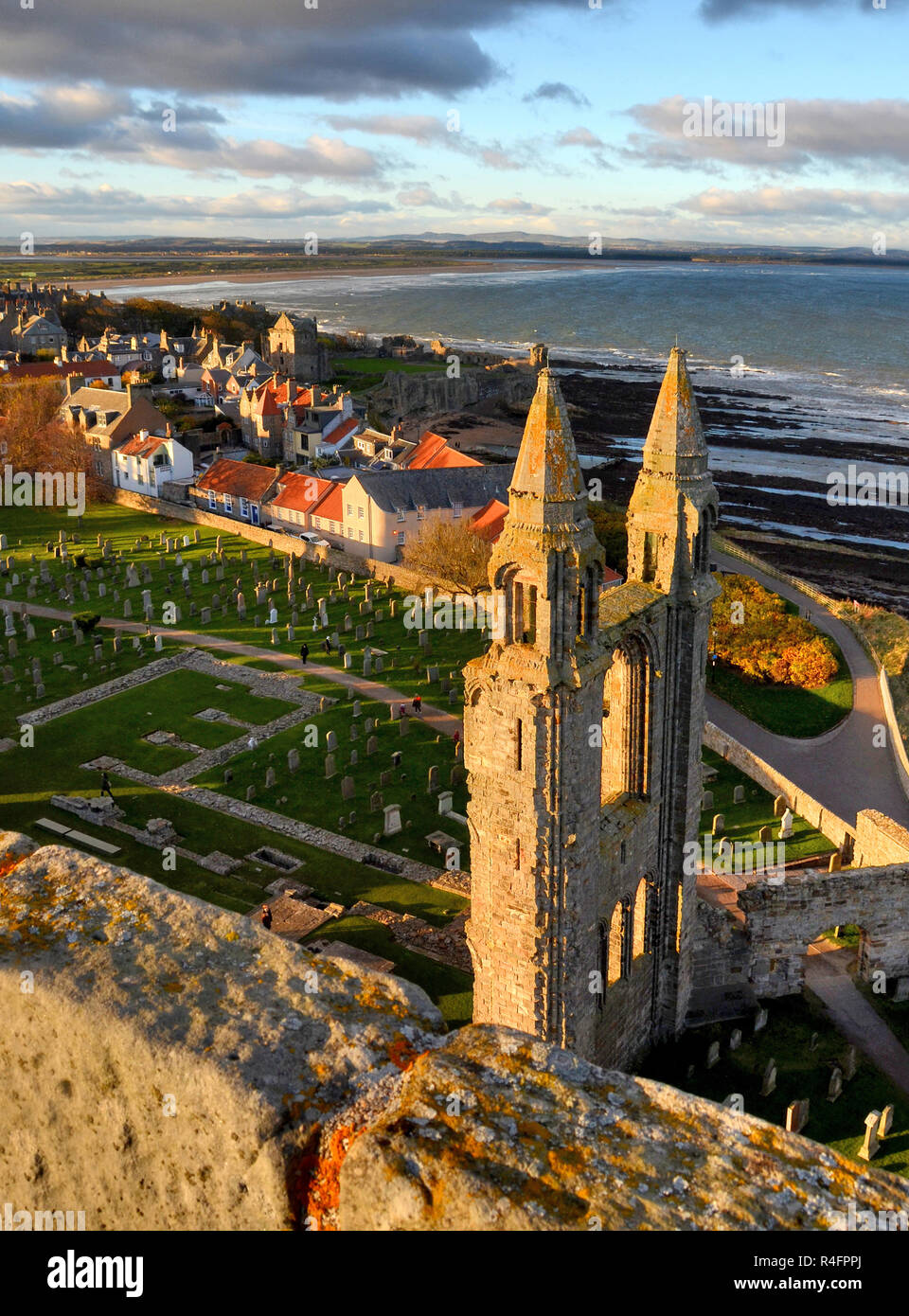 Looking down on the ruins of  the cathedral of St Andrews , Fife and the town and the west sands beyond.. Stock Photo