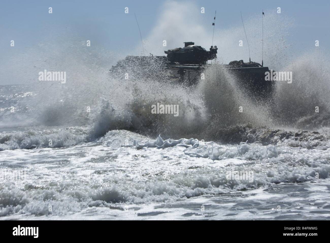 U.S. Marines with 2nd Assault Amphibian Battalion, 2nd Marine Division, (2d MARDIV), conduct an amphibious movement aboard an Assault Amphibious Vehicle (AAV-7A1) as part of Marine Corps Combat Readiness Evaluation, (MCCRE), Camp Lejeune, N.C., Oct. 24, 2016. MCCRE is a pre-deployment training evaluation designed to test the skills of Marines and Sailors with possible combat scenarios. Stock Photo