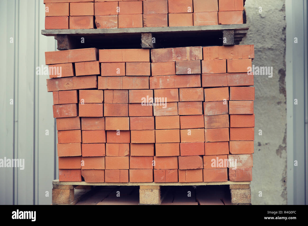 brown bricks batch on wooden storage tray Stock Photo