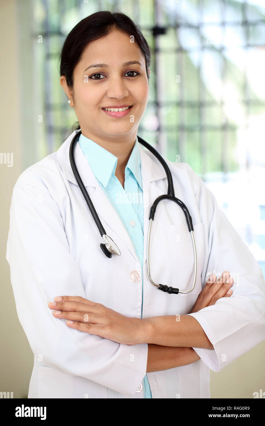 Female doctor in hospital interior Stock Photo - Alamy