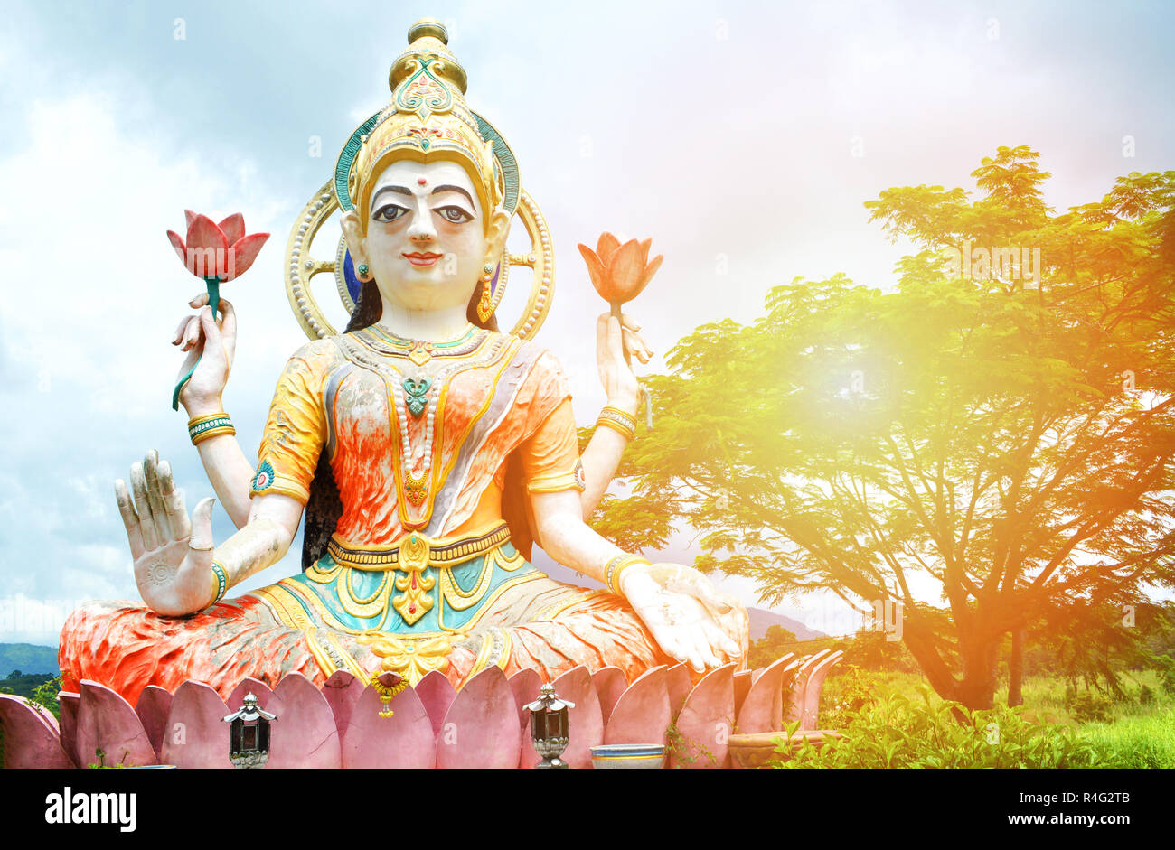 Guan Yin statue / colorful of statue Guan Yin on the rock outdoors at