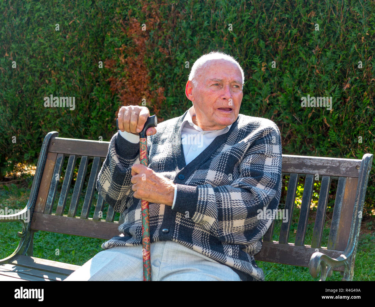 Old men sitting on seat bench spain hi-res stock photography and images ...