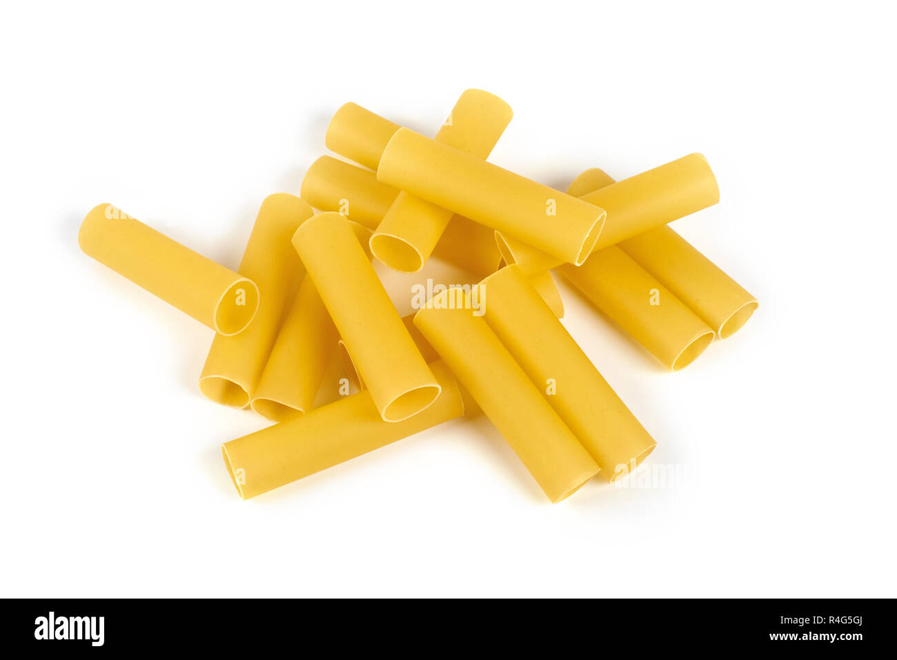 Italian cannelloni pasta tubes isolated over white background. Stock Photo