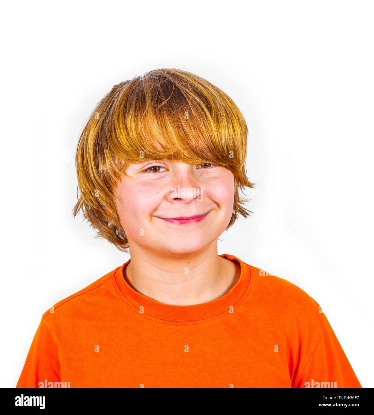 handsome smiling boy in orange shirt Stock Photo - Alamy