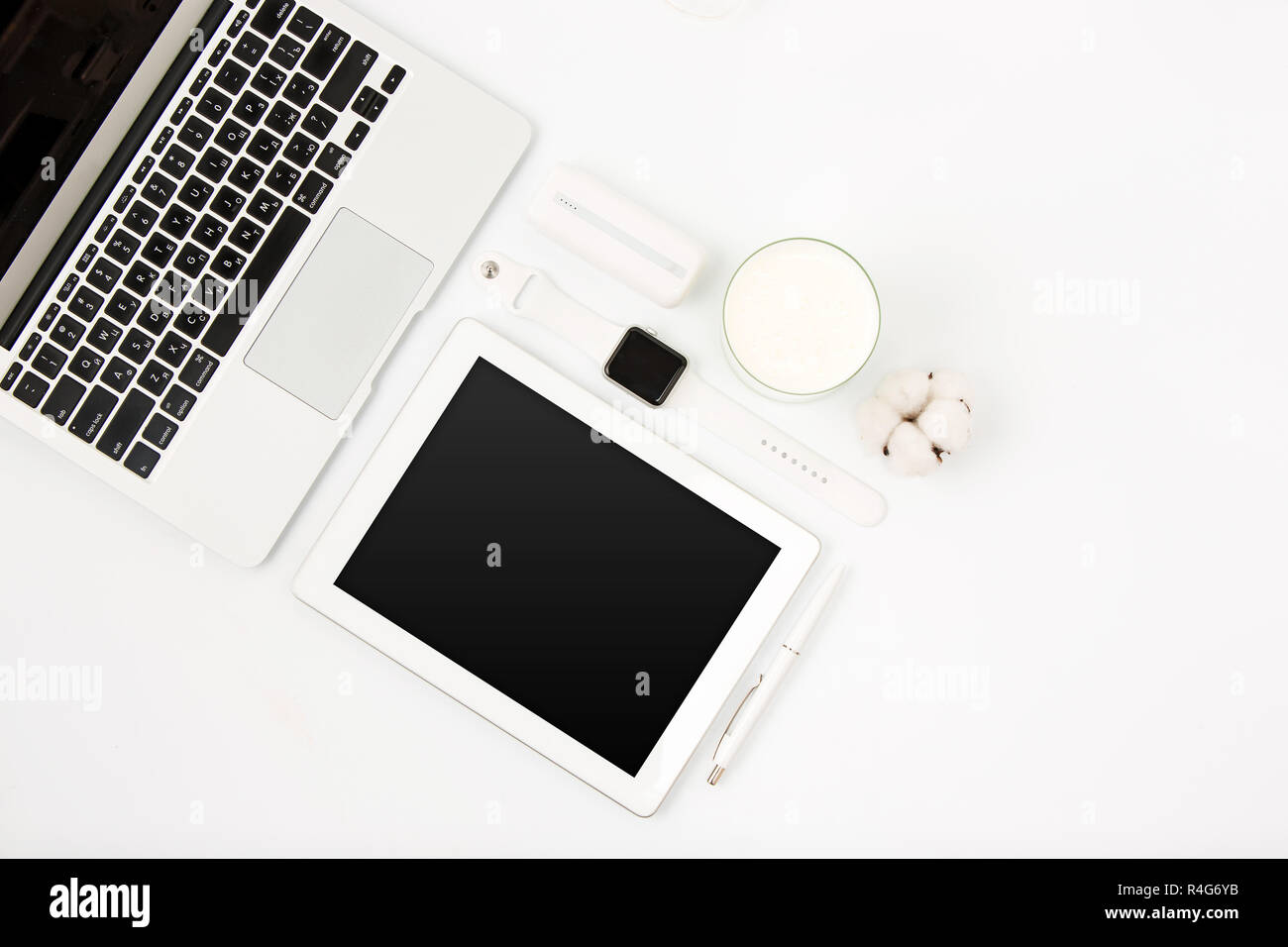 Top view of white office table with laptop Stock Photo - Alamy
