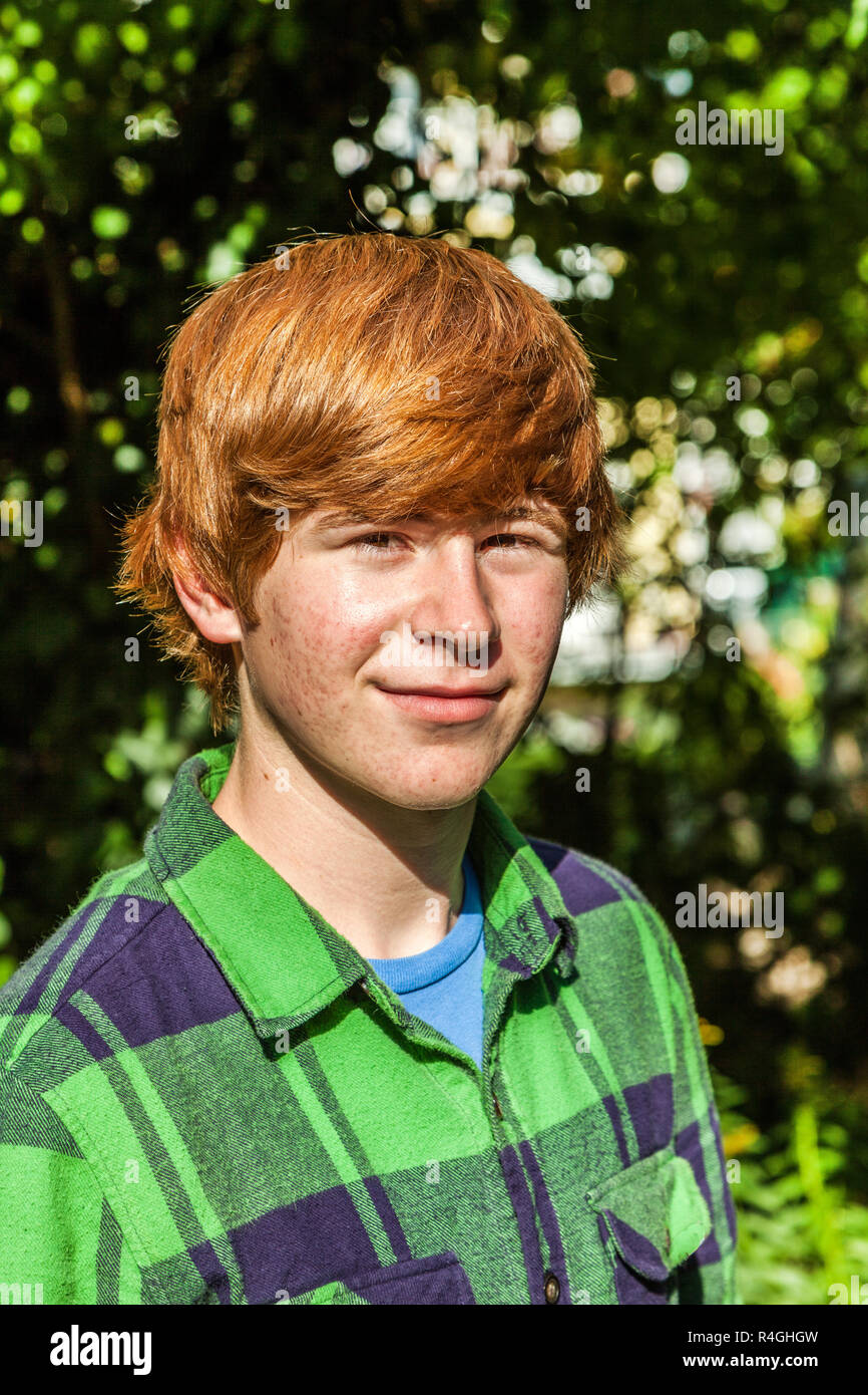portrait of attractive happy smiling boy in the garden Stock Photo - Alamy