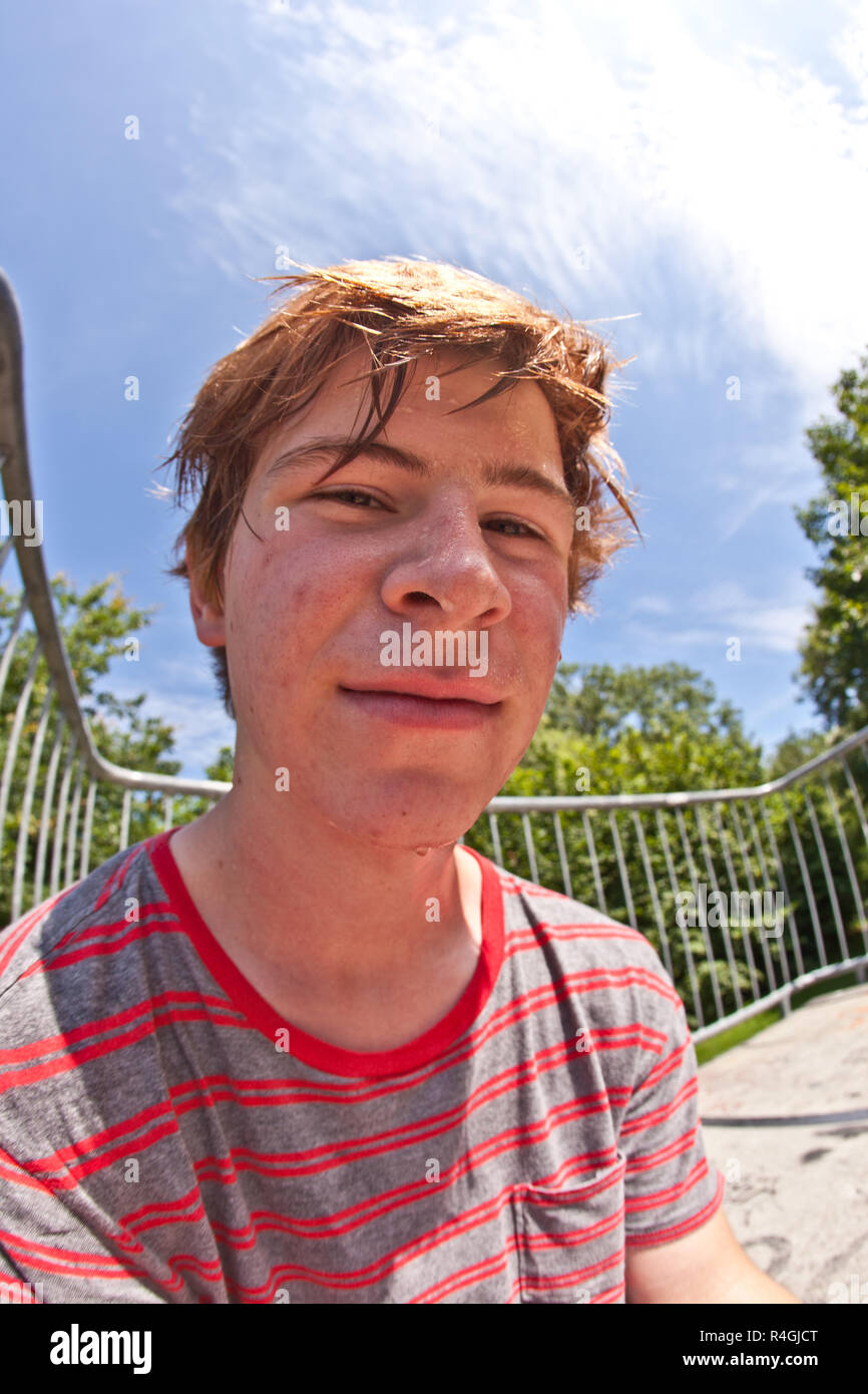 young happy boy sweating and exhausted from sports Stock Photo Alamy