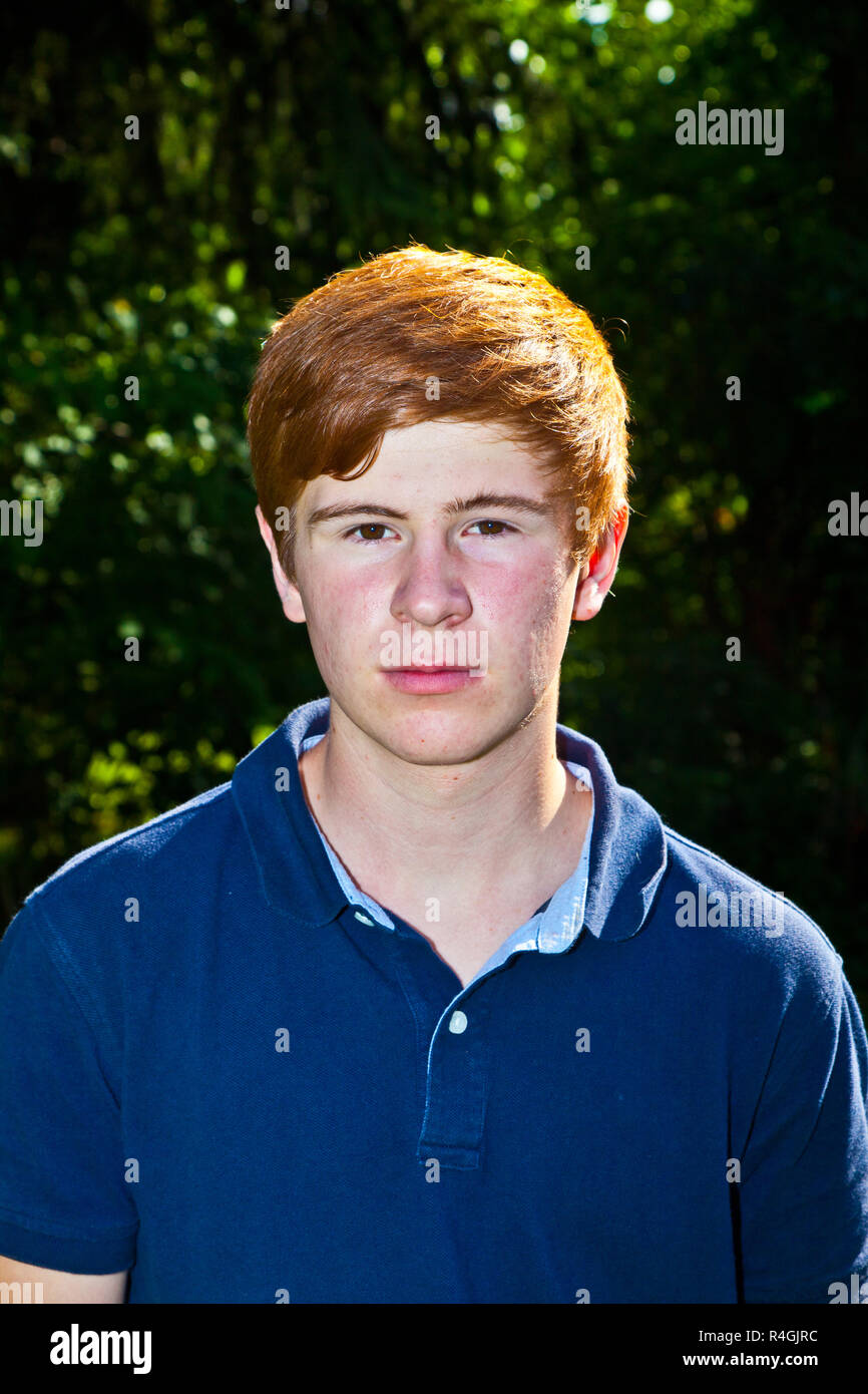 portrait of attractive happy smiling boy in the garden Stock Photo - Alamy