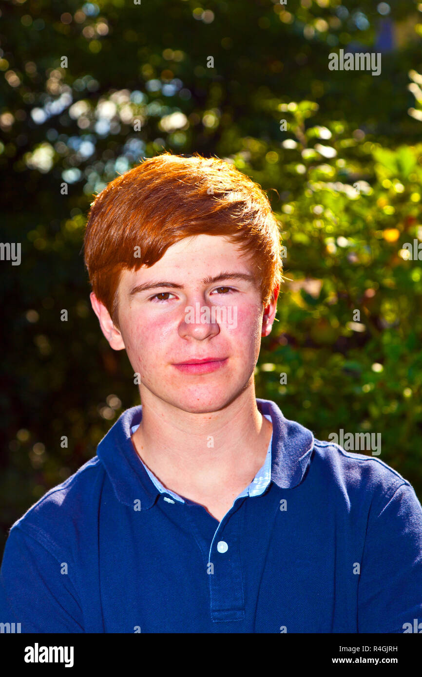 portrait of attractive happy smiling boy in the garden Stock Photo - Alamy