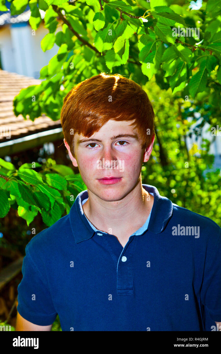 portrait of attractive happy smiling boy in the garden Stock Photo - Alamy