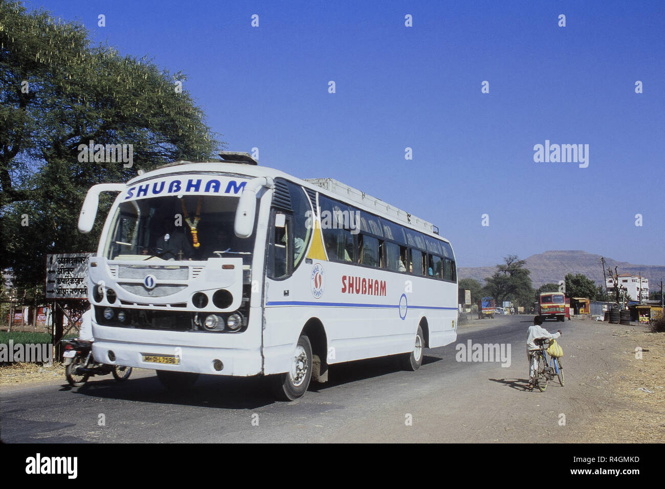 Tourist bus moving on National Highway, Otur, Pune, Maharashtra, India, Asia Stock Photo