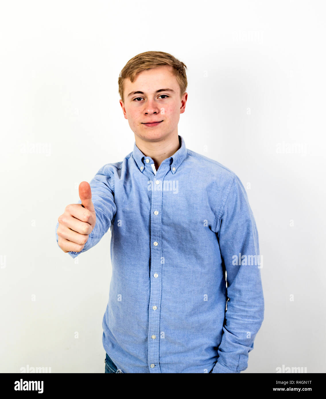 boy shows thumbs up sign Stock Photo - Alamy