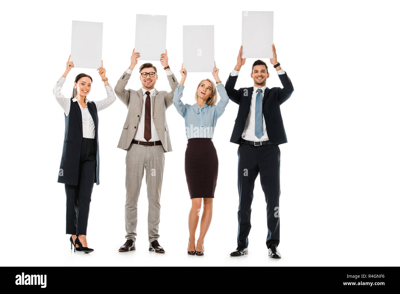 smiling businesspeople holding empty boards isolated on white Stock Photo