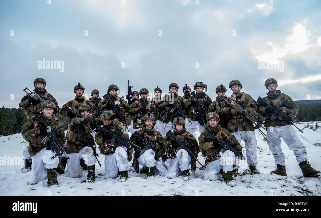 Norwegian soldiers from the Armoured Battalion, 2nd Brigade pose for photo  near Røros, Norway during exercise Trident Juncture. Trident Juncture 18 is  NATO's biggest exercise in decades, bringing together more than 50,000