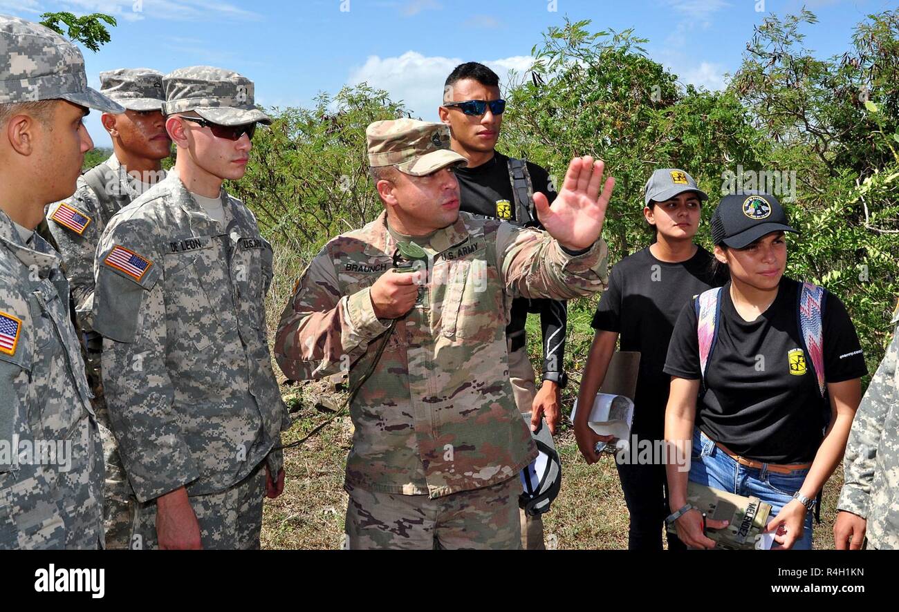 Camp Santiago Joint Training Center hosted a group of 115 cadets and 11 cadres from the Army ROTC (Reserve Officers' Training Corps) from the UPR-Rio Piedras for a Land Navigation Training conducted at training areas India (I) and Juliette (J) in Salinas, Puerto Rico, Sept. 29.  During this event, cadets from basic Military Science course were introduced to the Land Navigation Course using a map and magnetic compass in the fields of Camp Santiago while those in the more advanced course will have the opportunity to be tested on a self-corrected Land Navigation Course in order to better prepare  Stock Photo