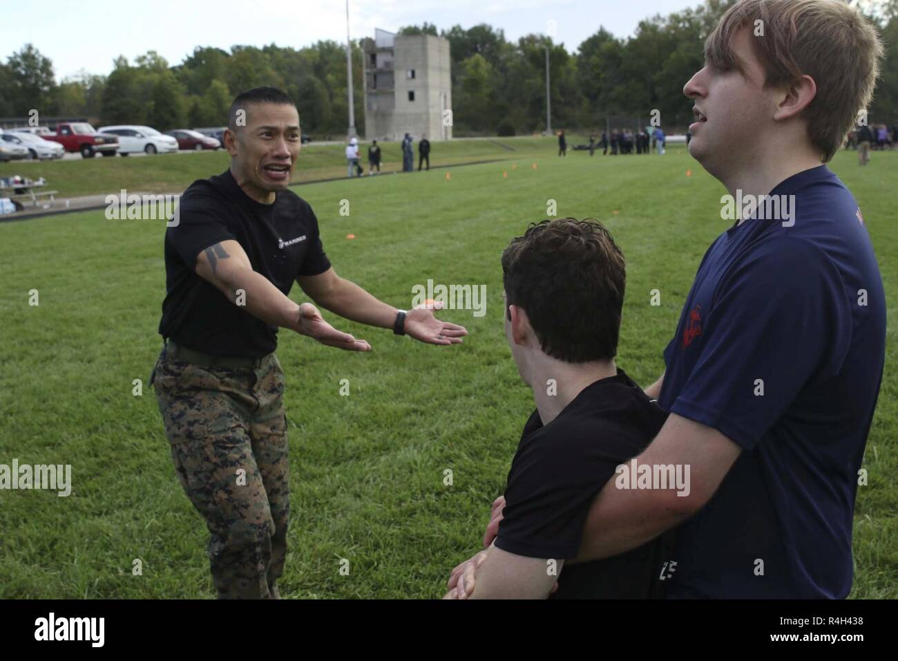 Sgt. Maj. Lester Abanto motivates a poolee September 29, 2018, in Indianapolis during a leadership and cohesion exercise. This exercise allowed Marines to train some of the school athletes the way the Marine Corps instructs its subordinates. Abanto is the sergeant major of Recruiting Station Indianapolis. Stock Photo