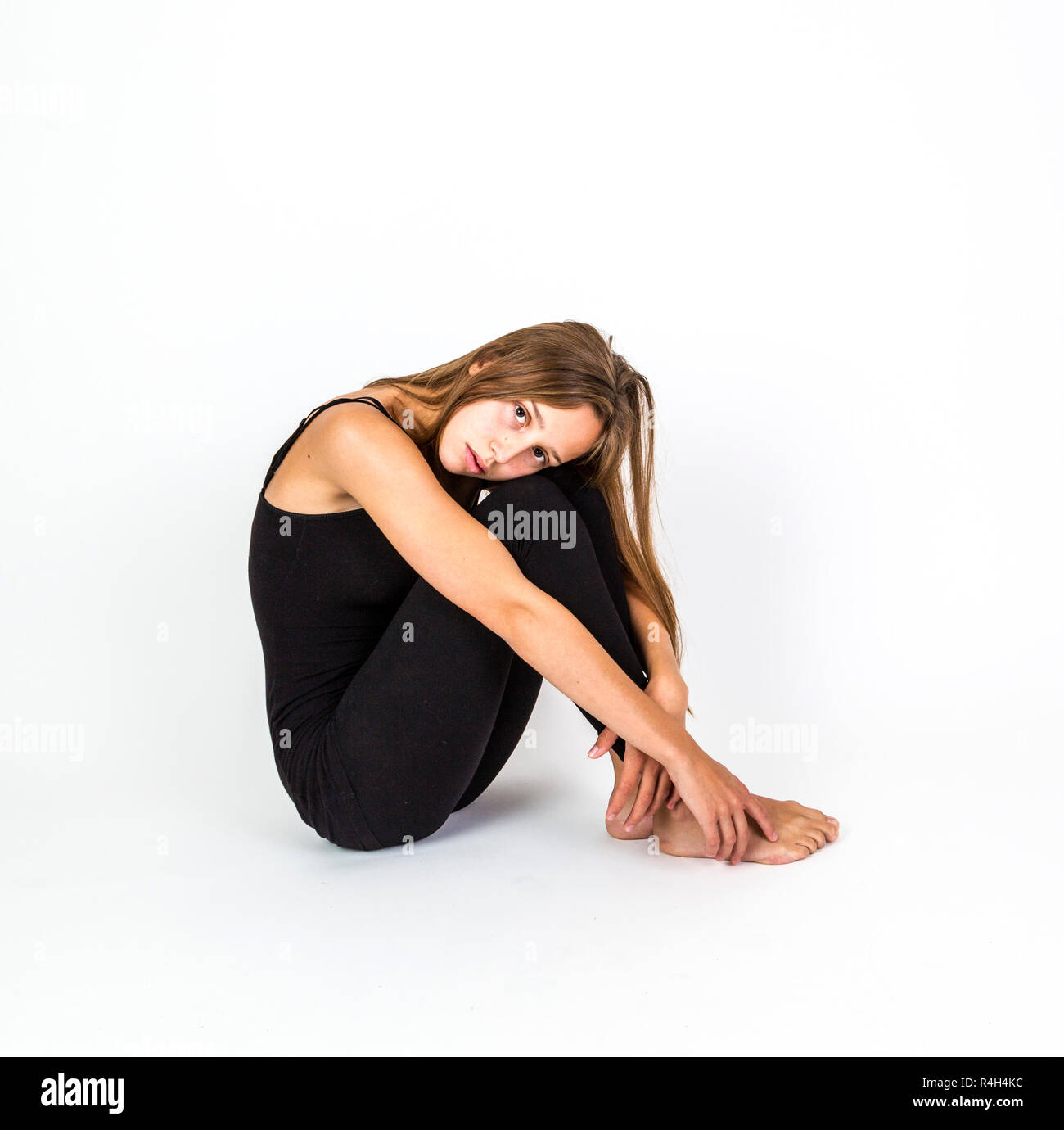 smiling young beautiful girl with brown hair Stock Photo - Alamy