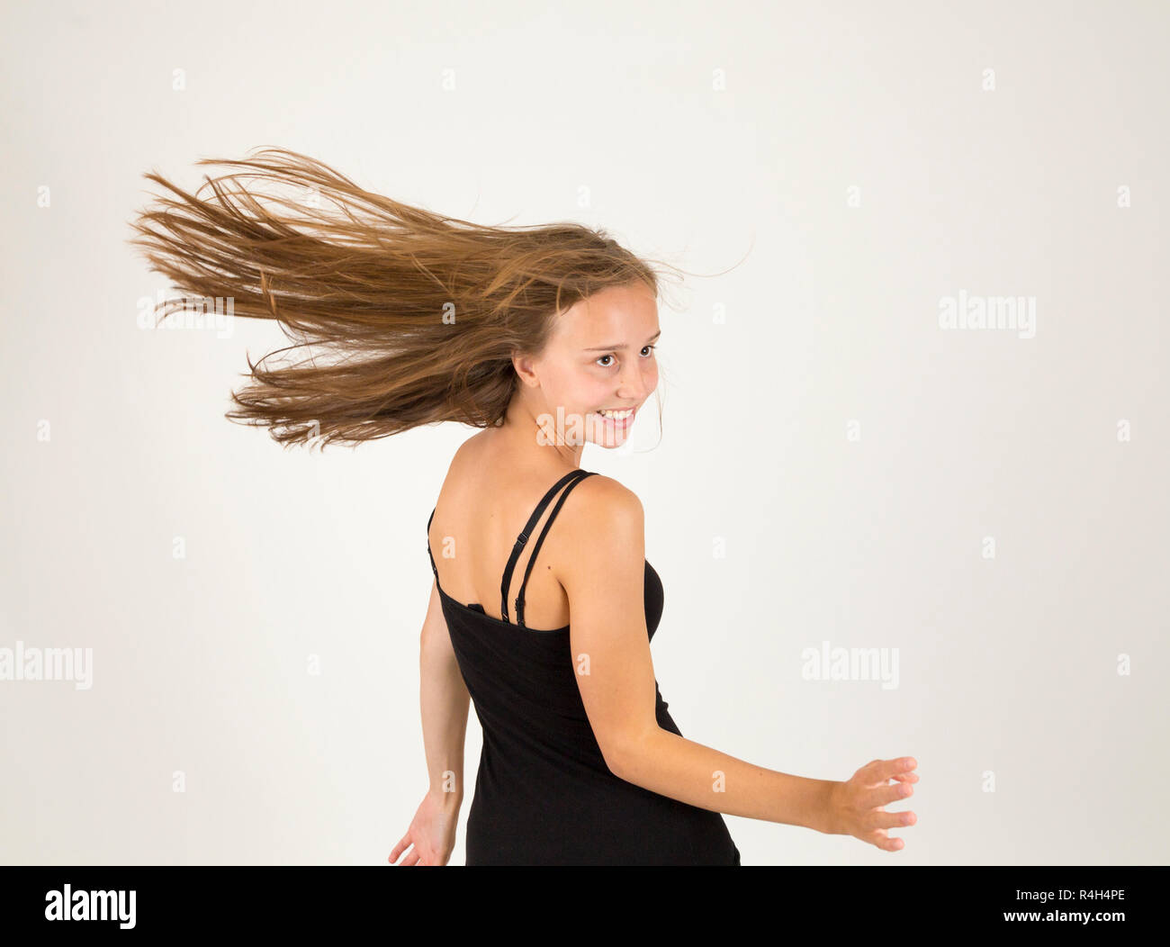 smiling young beautiful girl with brown hair Stock Photo - Alamy
