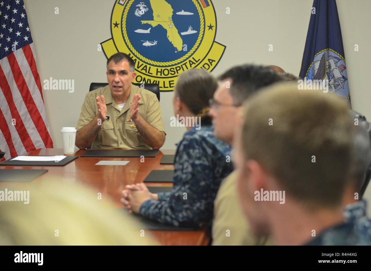 JACKSONVILLE, Fla. (Sept. 27, 2018) Capt. Matthew Case, Naval Hospital Jacksonville commanding officer, speaks at a pre-deployment briefing at the hospital. Twenty five U.S. military medicine personnel from the hospital and its five branch health clinics will deploy this fall with the hospital ship USNS Comfort (T-AH 20) to Central and South America. Stock Photo