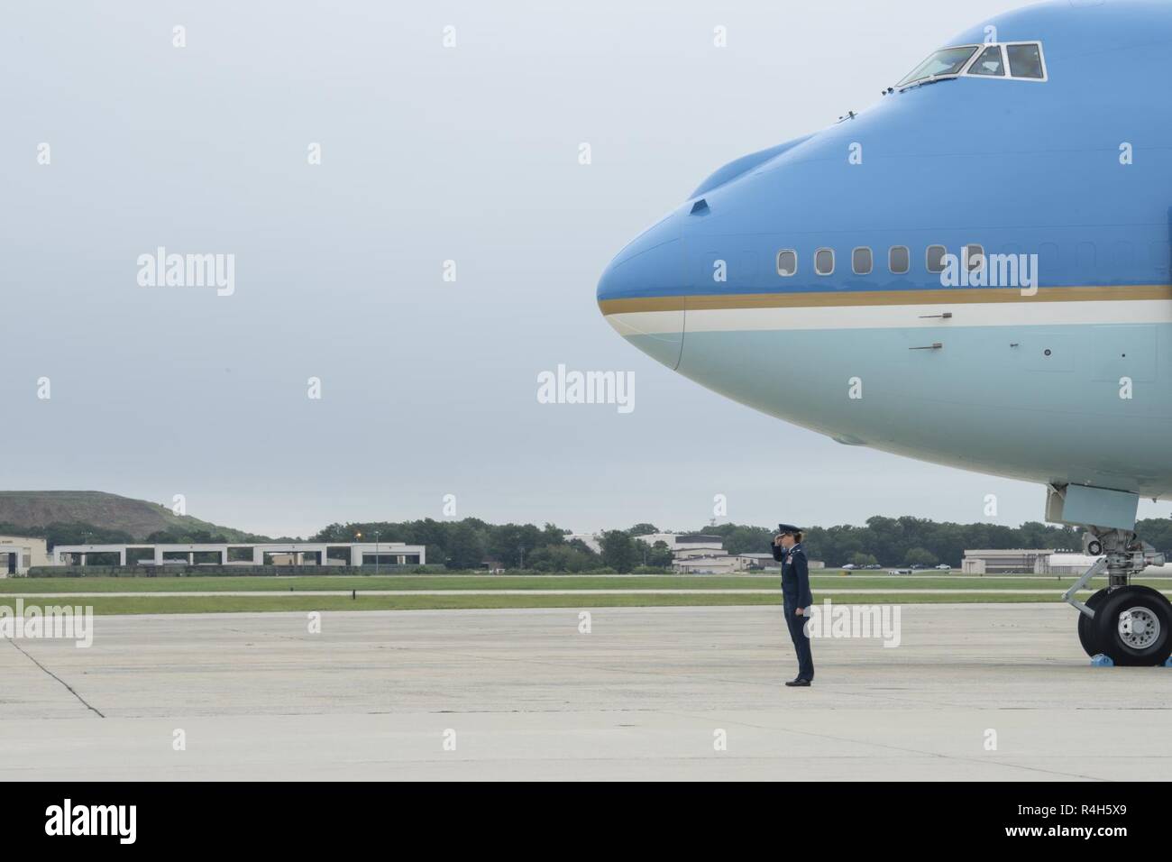 Col. Rebecca Sonkiss, 89th Airlift Wing commander, salutes President
