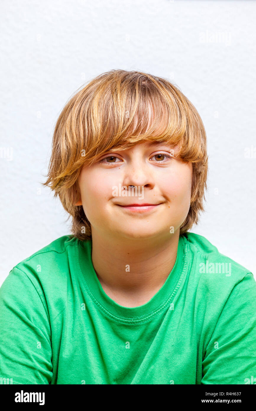 cute boy in green shirt Stock Photo - Alamy
