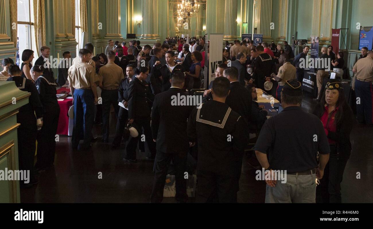 SAN FRANCISCO (Oct. 2, 2018) Sailors and Marines particpating in the 2018 San Francisco Fleet Week (SFFW) interact with local organizations at the Veterans Resource Fair in the San Francisco War Memorial Veterans building. SFFW is an opportunity for the American public to meet their Navy, Marine Corps and Coast Guard teams and experience America's sea services. During fleet week, service members participate in various community service events, showcase capabilities and equipment to the community, and enjoy the hospitality of San Francisco and its surrounding areas. Stock Photo