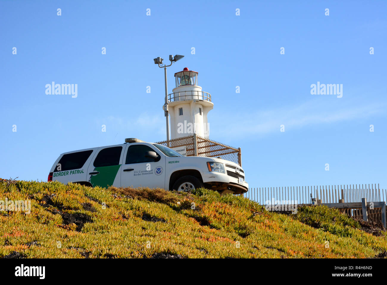 SAN YSIDRO, CALIFORNIA - NOVEMBER 26, 2018: A Border Patrol Vehicle watches over the beach and border at Imperial Beach, San Ysidro. Stock Photo