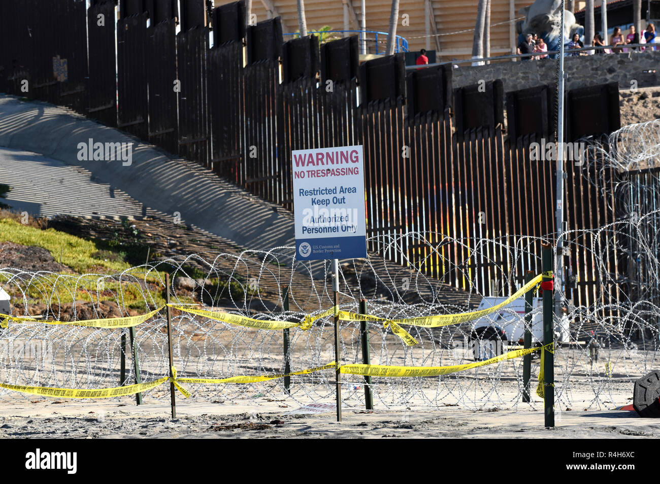 SAN YSIDRO, CALIFORNIA - NOVEMBER 26, 2018: Restricted Area along the USA Mexico Border Wall at Imperial Beach with Tijuana beyond the barrier. Stock Photo