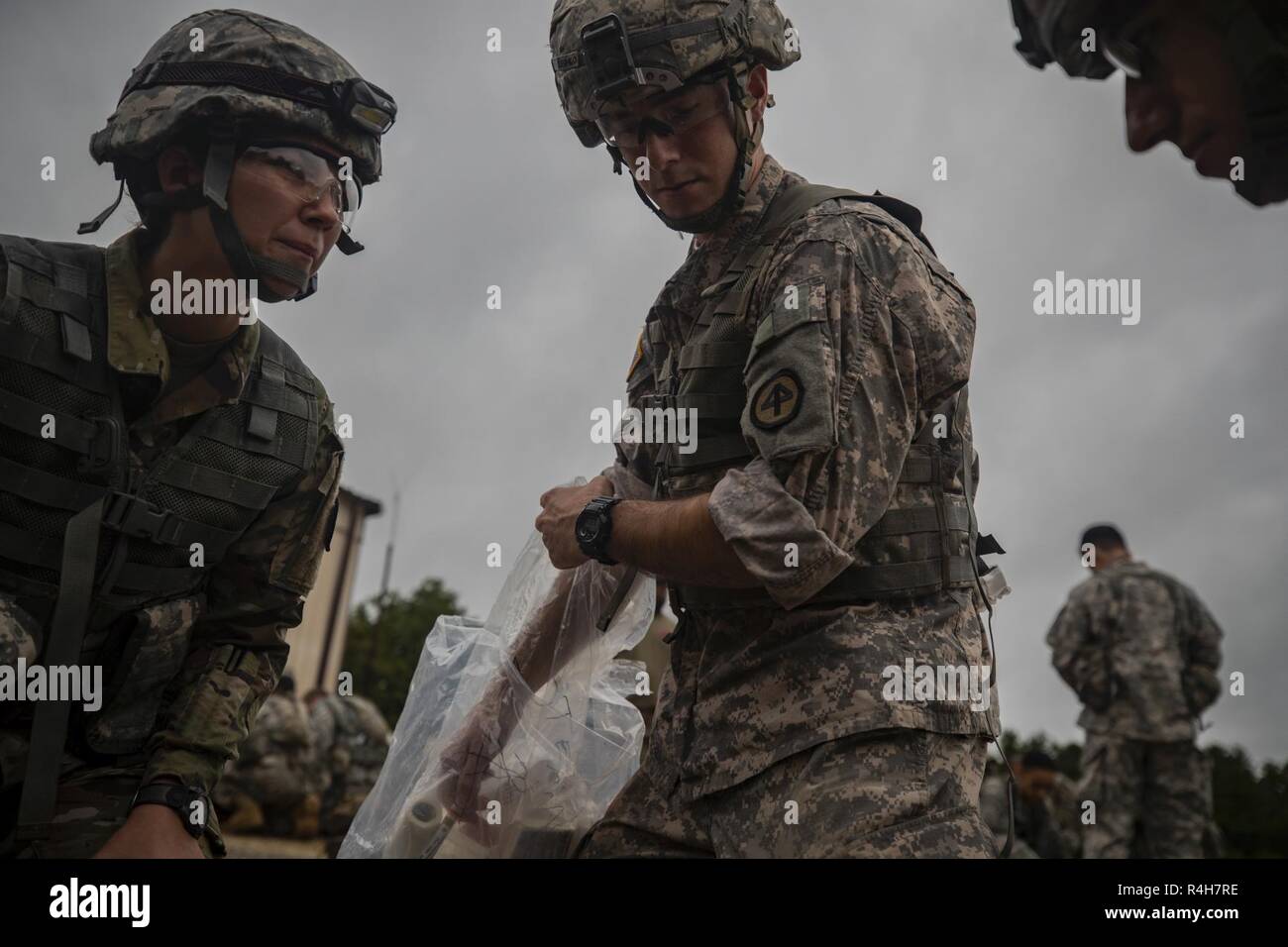 New Jersey Army National Guard combat medics prepare their medical equipment during a tactical
