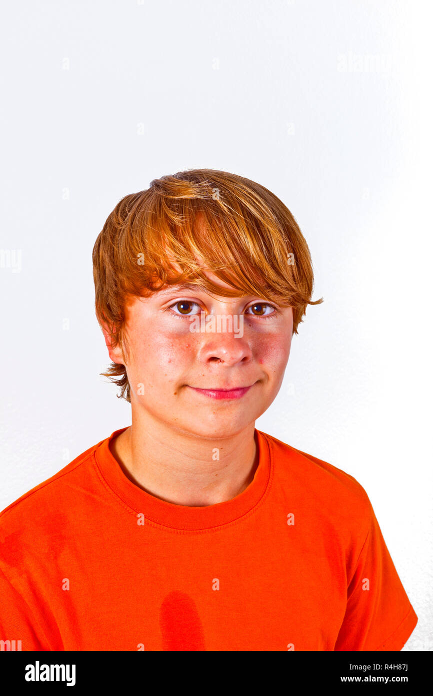 Portrait Of Cute Boy With Orange Shirt Stock Photo 226573078 Alamy