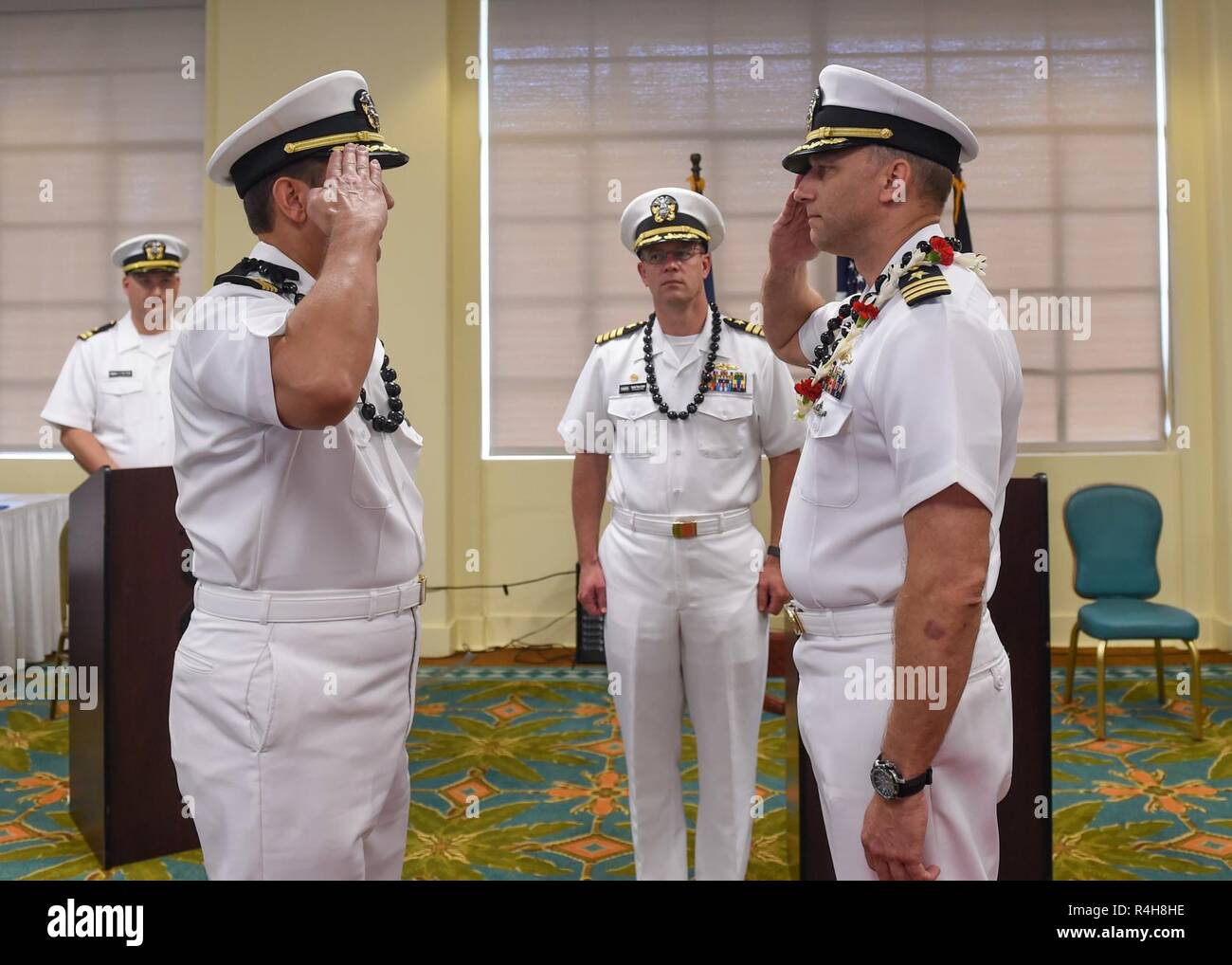 PEARL HARBOR (Oct. 3, 2018) Capt. Dave Grisham, left, is relieved by ...