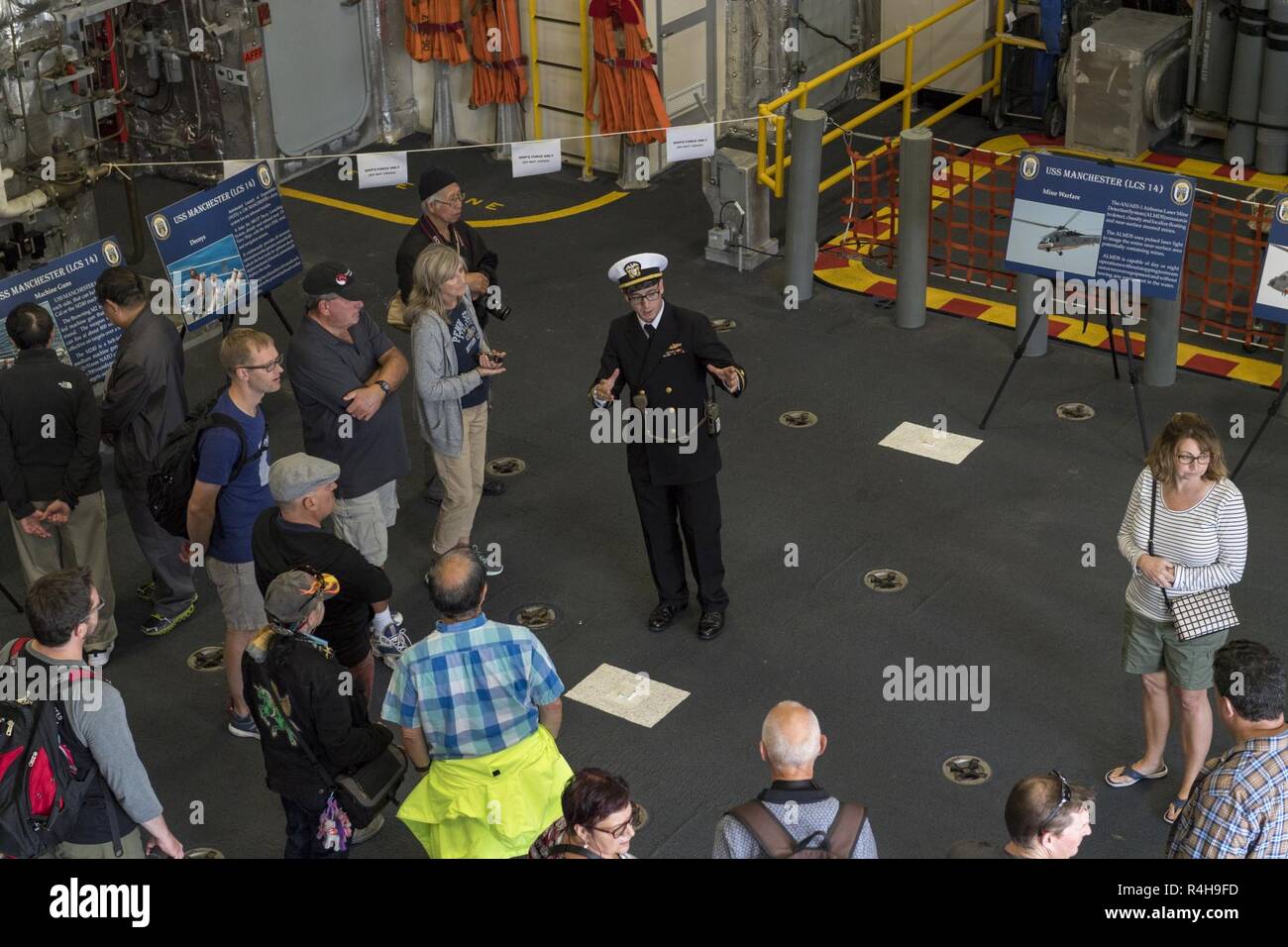 SAN FRANCISCO (Oct. 3, 2018) Lt. Adam Schalk gives a guided public tour of the Independence-variant littoral combat ship USS Manchester (LCS 14) during San Francisco Fleet Week (SFFW) 2018. SFFW is an opportunity for the American public to meet their Navy, Marine Corps and Coast Guard teams and experience America's sea services. During fleet week, service members participate in various community service events, showcase capabilities and equipment to the community, and enjoy the hospitality of San Francisco and its surrounding areas. Stock Photo