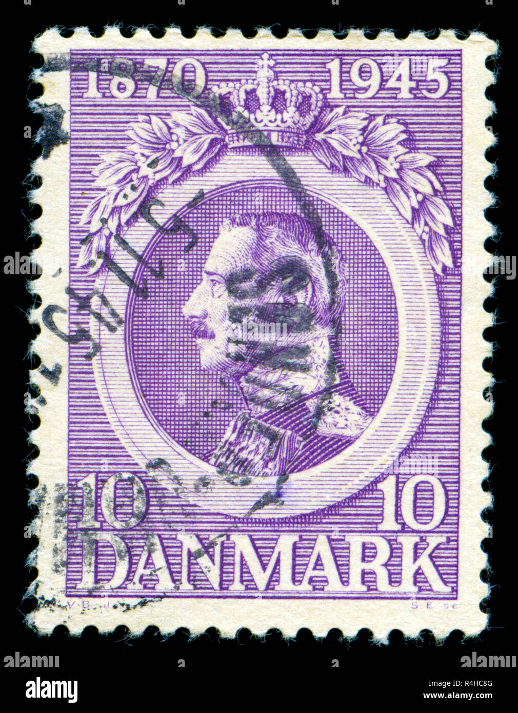 Postmarked stamp from Denmark in the King Christian X - 75th Anniversary series issued in 1945 Stock Photo