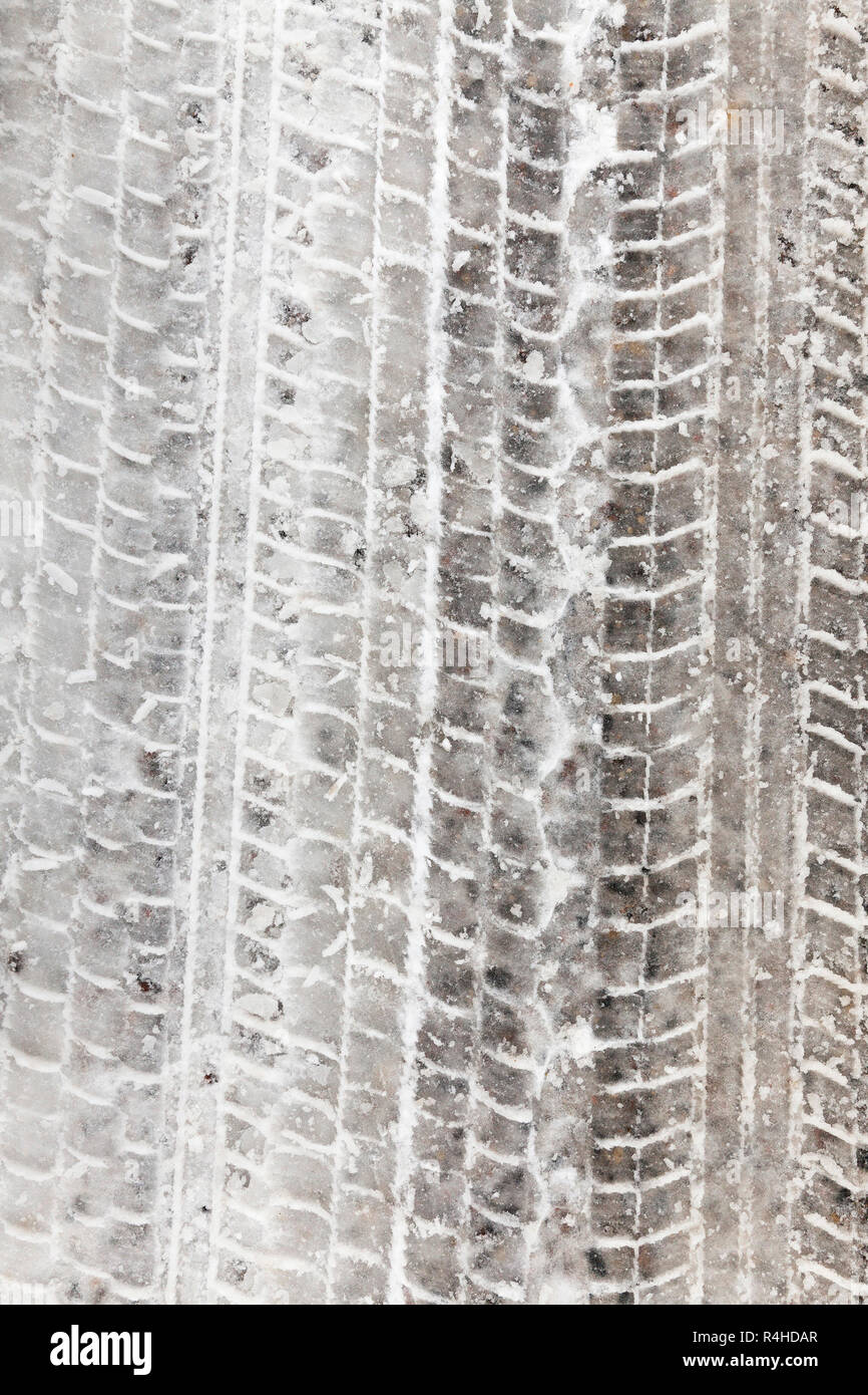 traces of the car on snow Stock Photo - Alamy