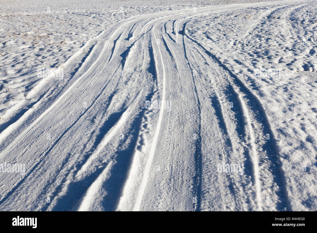 traces of the car on snow Stock Photo - Alamy