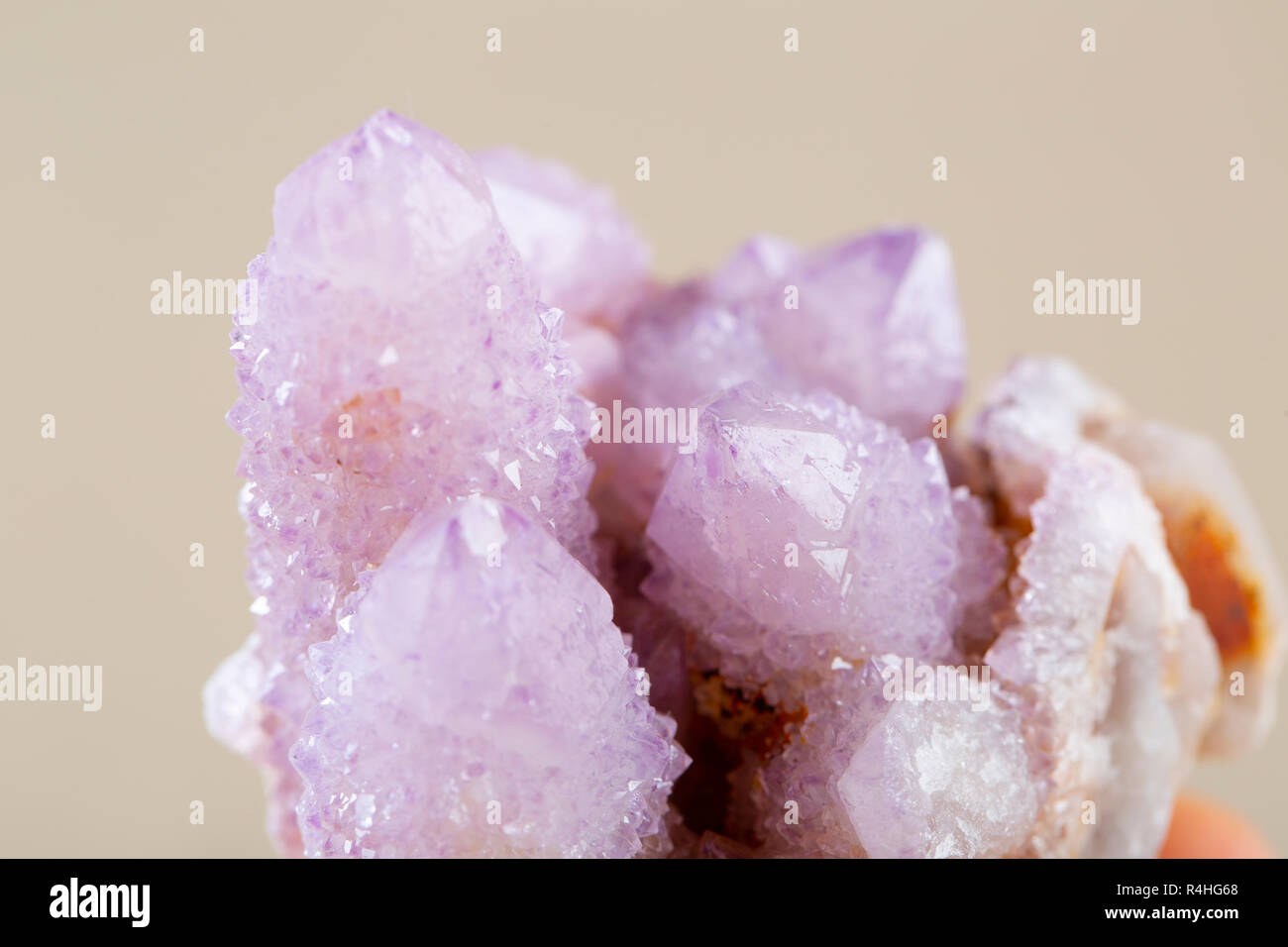 Pretty Sparkle Amethyst Spirit Quartz cluster from South Africa, isolated on white background Stock Photo