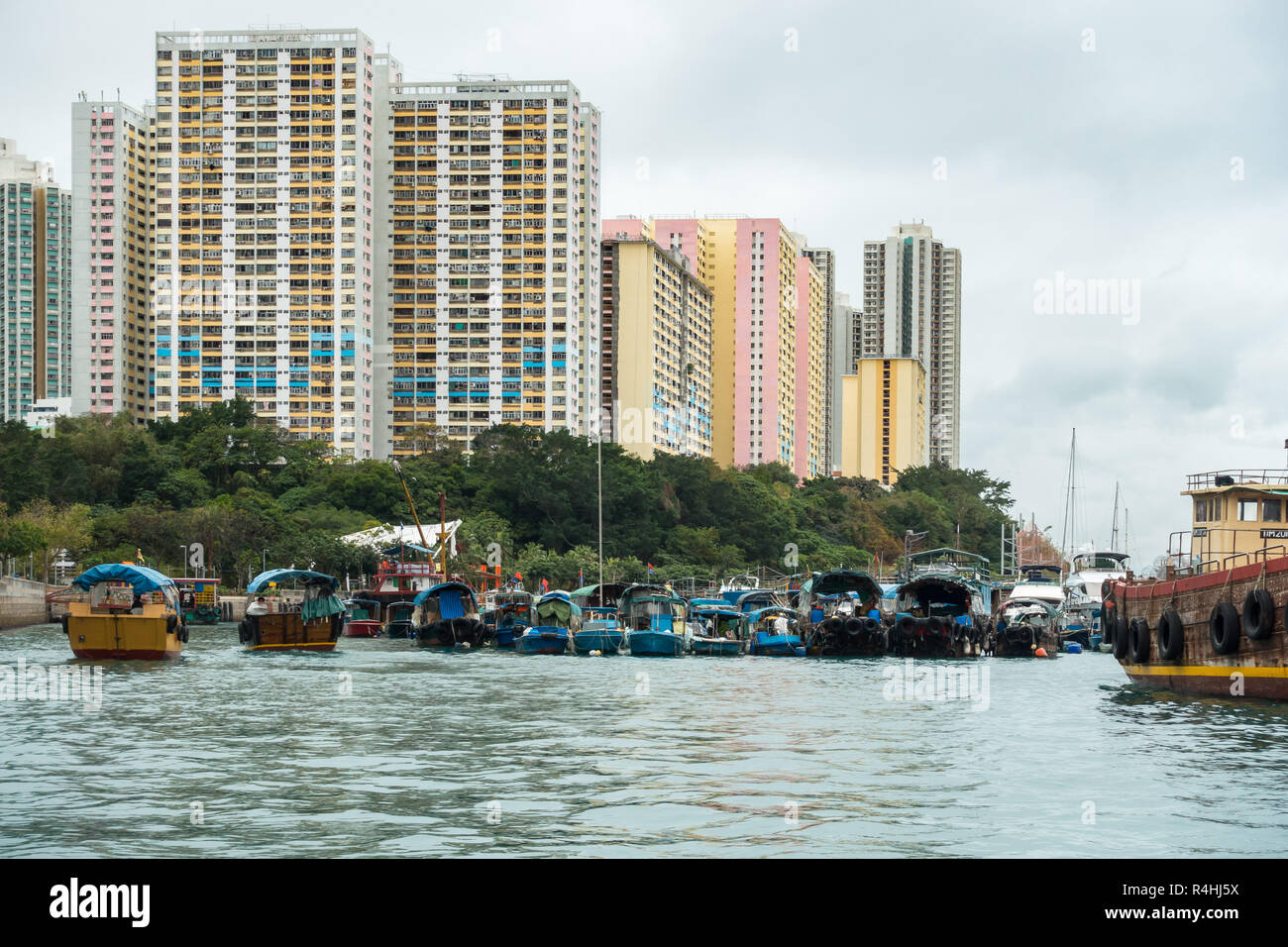Sampan cruise in Aberdeen harbour, famous for the floating village with old junks and house boats, Hong Kong Stock Photo