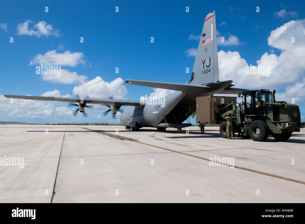 Cargo is loaded onto a C-130J Super Hercules, Nov. 27, 2018, at the Saipan International Airport, Saipan, Commonwealth of the Northern Mariana Islands. Service members from Joint Region Marianas and U.S. Indo-Pacific Command are providing Department of Defense support to the CNMI's civil and local officials as part of the Federal Emergency Management Agency-supported Super Typhoon Yutu recovery efforts. (U.S. Air Force Photo by Tech. Sgt. Joshua J. Garcia) Stock Photo
