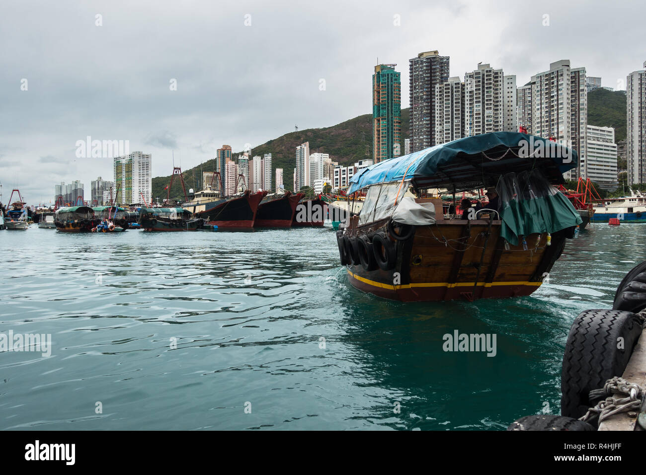 Sampan ride at the Aberdeen floating village. Sampan are small chinese wooden boats used for