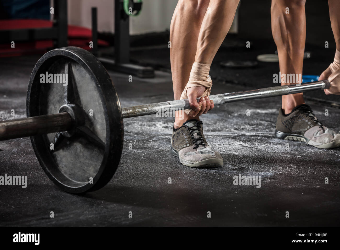Person Lifting Barbell Stock Photo