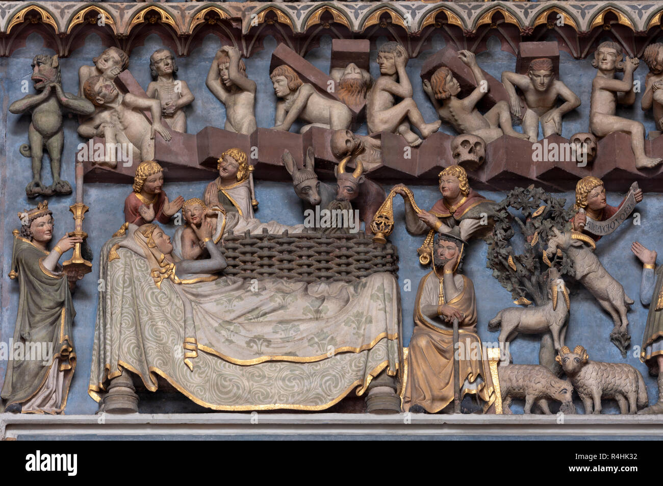 Freiburg, Münster Unserer Lieben Frau, Portalvorhalle, Tympanon, betender Teufel, Geburt Christi Stock Photo