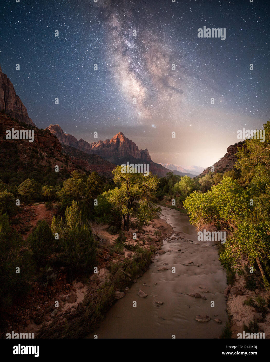 Milky way above Virgin River And Watchman Mountain,  Canyon Junction, Zion National Park, Utah, United States Stock Photo