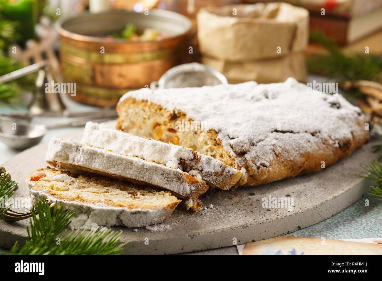 Traditional German stollen, sweet cake with candied fruit and raisins. Christmas sweet gift idea. Selective focus. Stock Photo