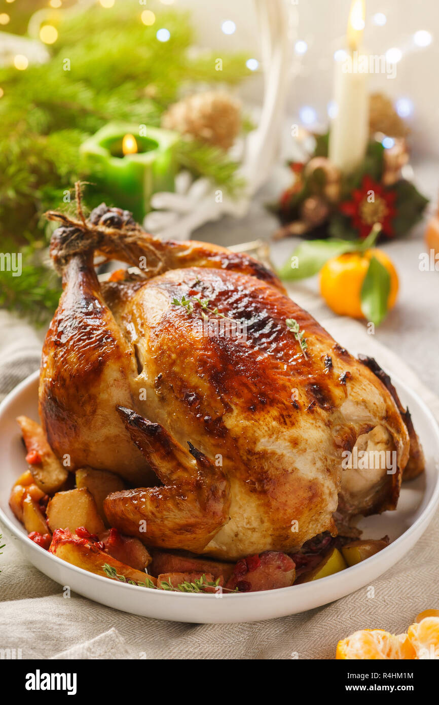 Christmas Whole Roast Chicken With Tangerines Apples And Thyme On