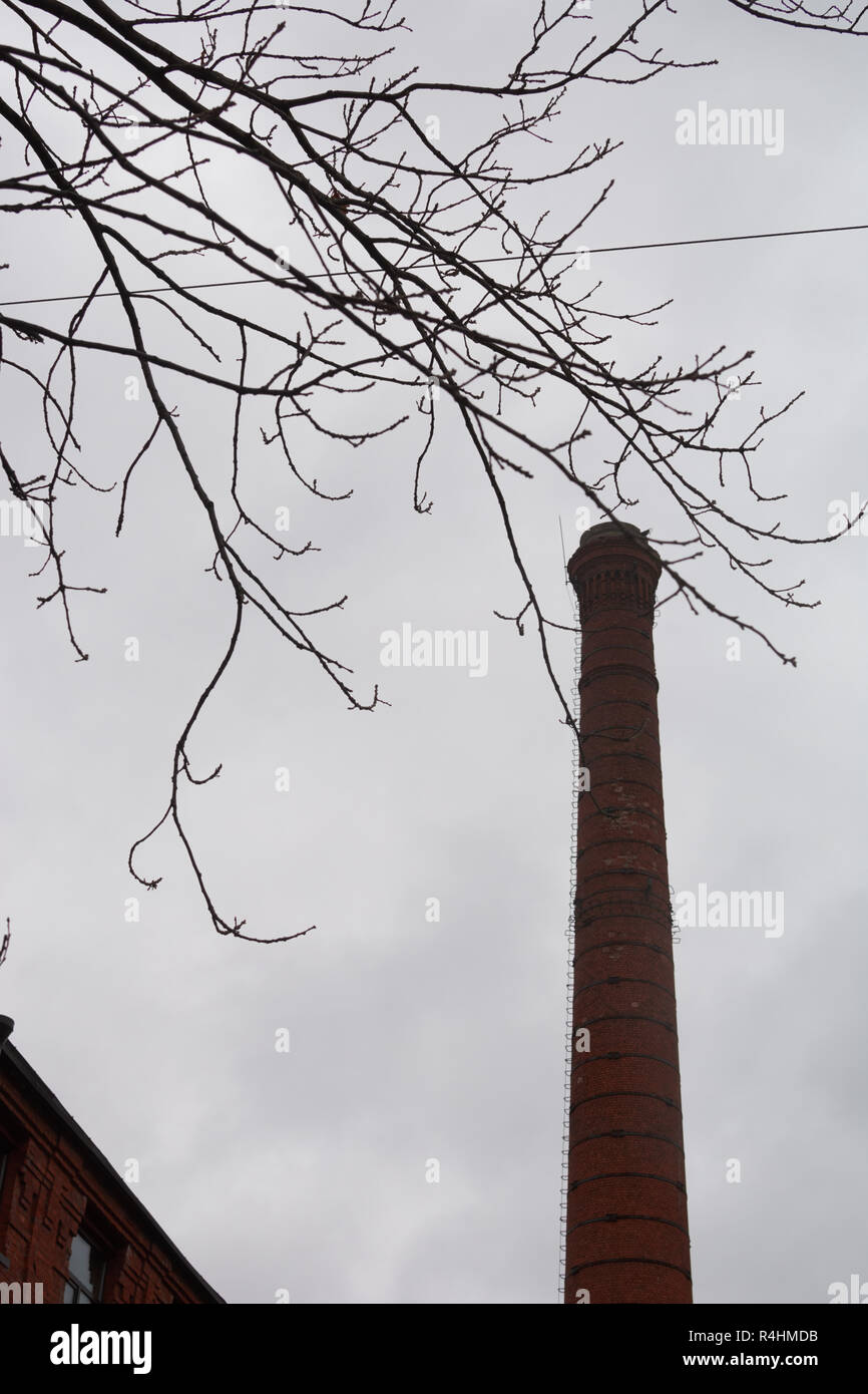brick tower at the old building against the sky on a cloudy day Stock ...