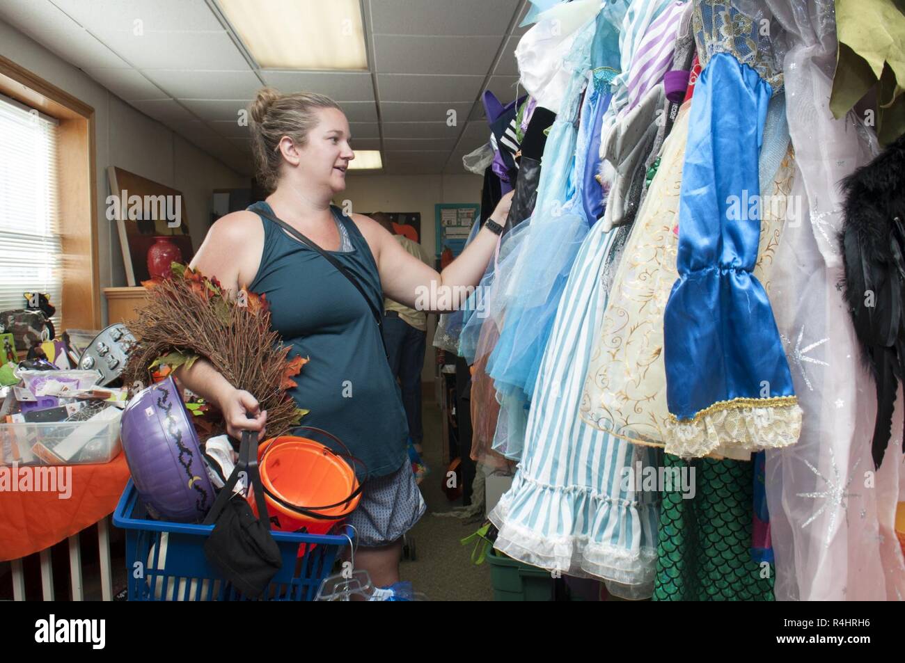 JOINT BASE PEARL HARBOR-HICKAM — Erin Sanders browses items at the Hickam Thrift Shop aboard Joint Base Pearl Harbor-Hickam, Sept. 26, 2018. The Hickam Officers' Spouses' Club operates the Hickam Thrift Shop. Stock Photo