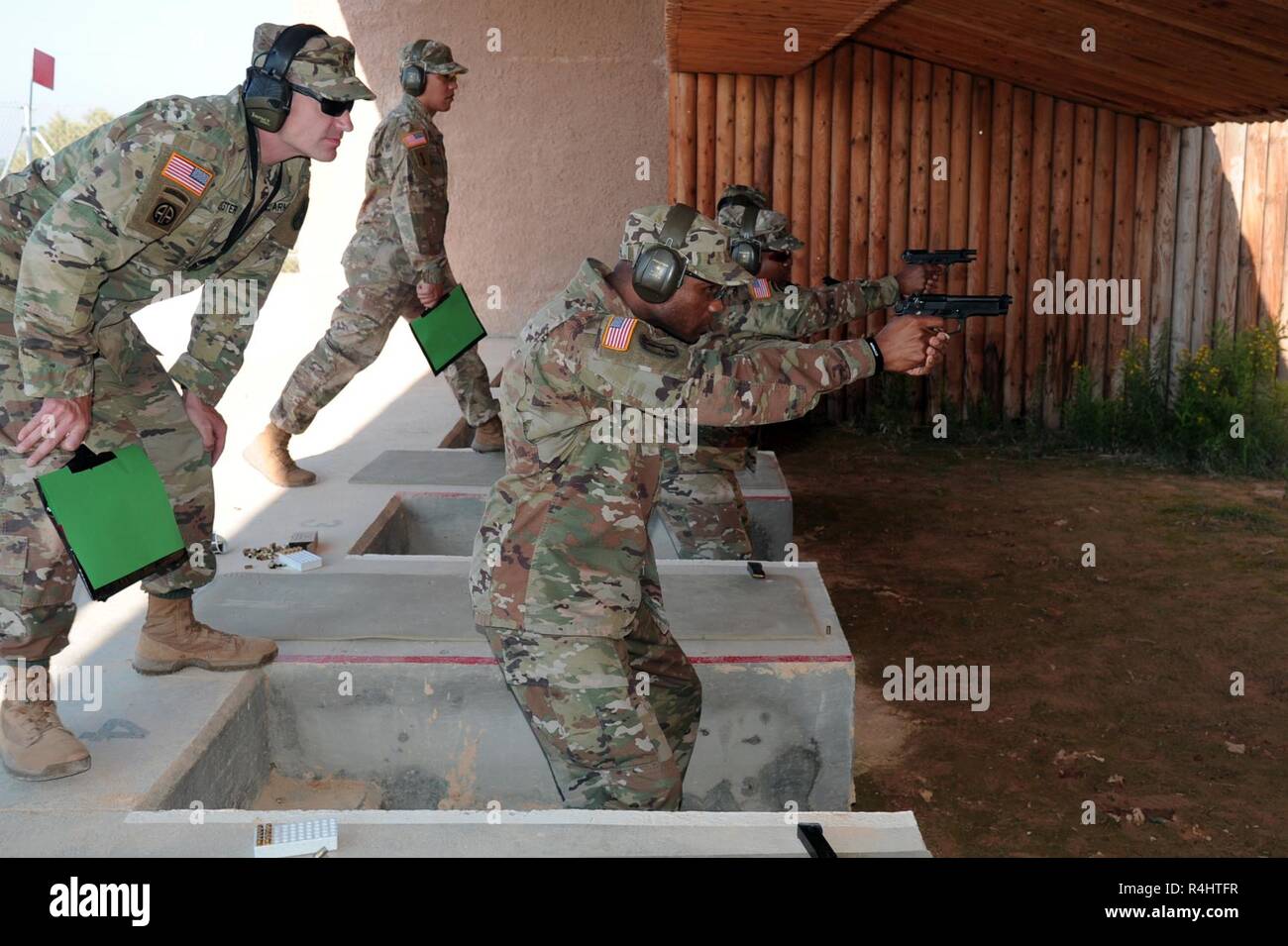 US Army Soldiers from NRDC Spain fire an M9 9mm pistol during qualification  range at Military Base Jaime I, Headquarters NATO Rapid Deployable Corps- Spain (HQ NRDC ESP) Valencia, Spain, Sep 28, 2018