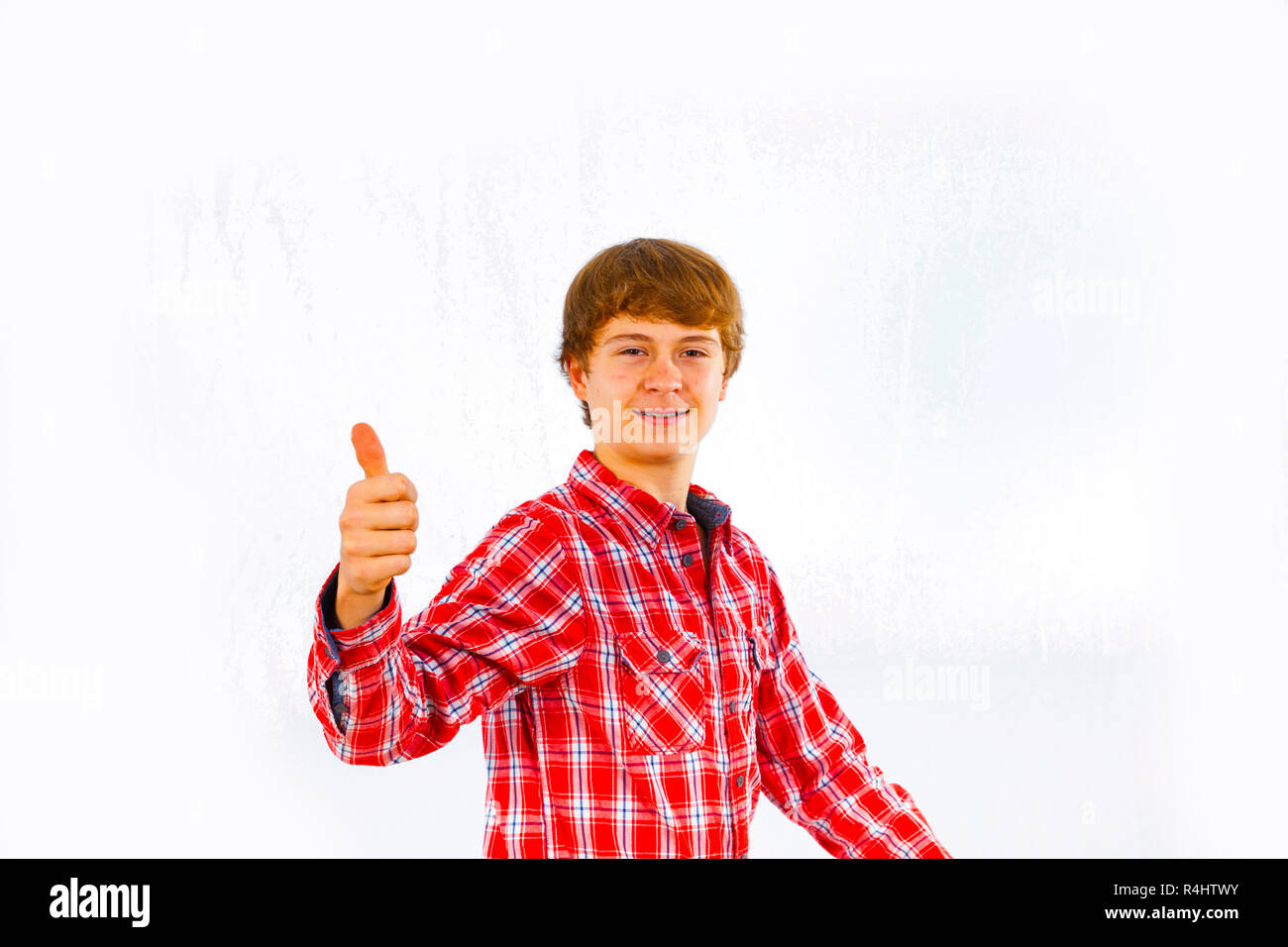 attractive smiling boy in studio Stock Photo