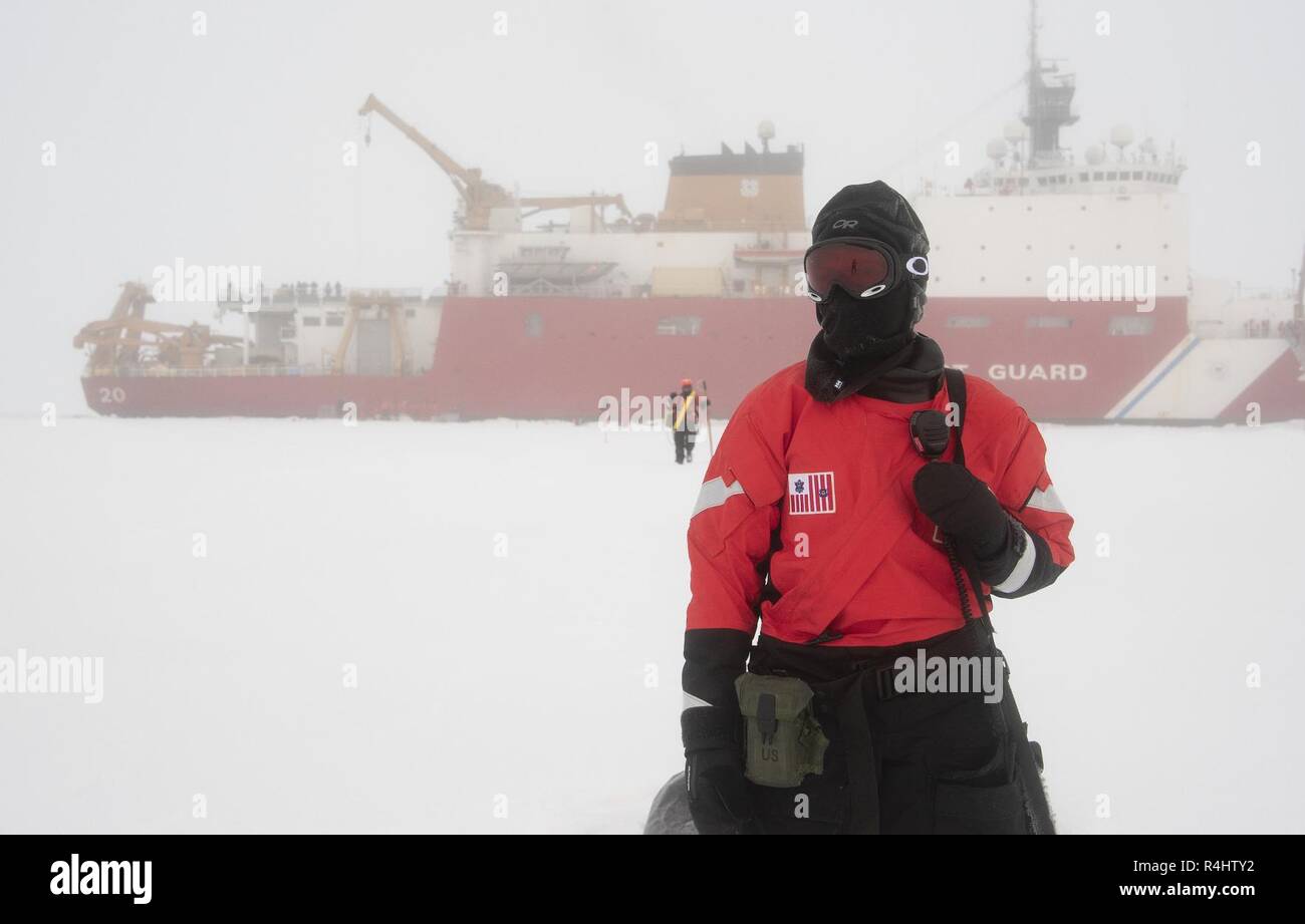 ARCTIC OCEAN U.S. Coast Guard Petty Officer 1st Class Lisa Densmore stands polar bear guard